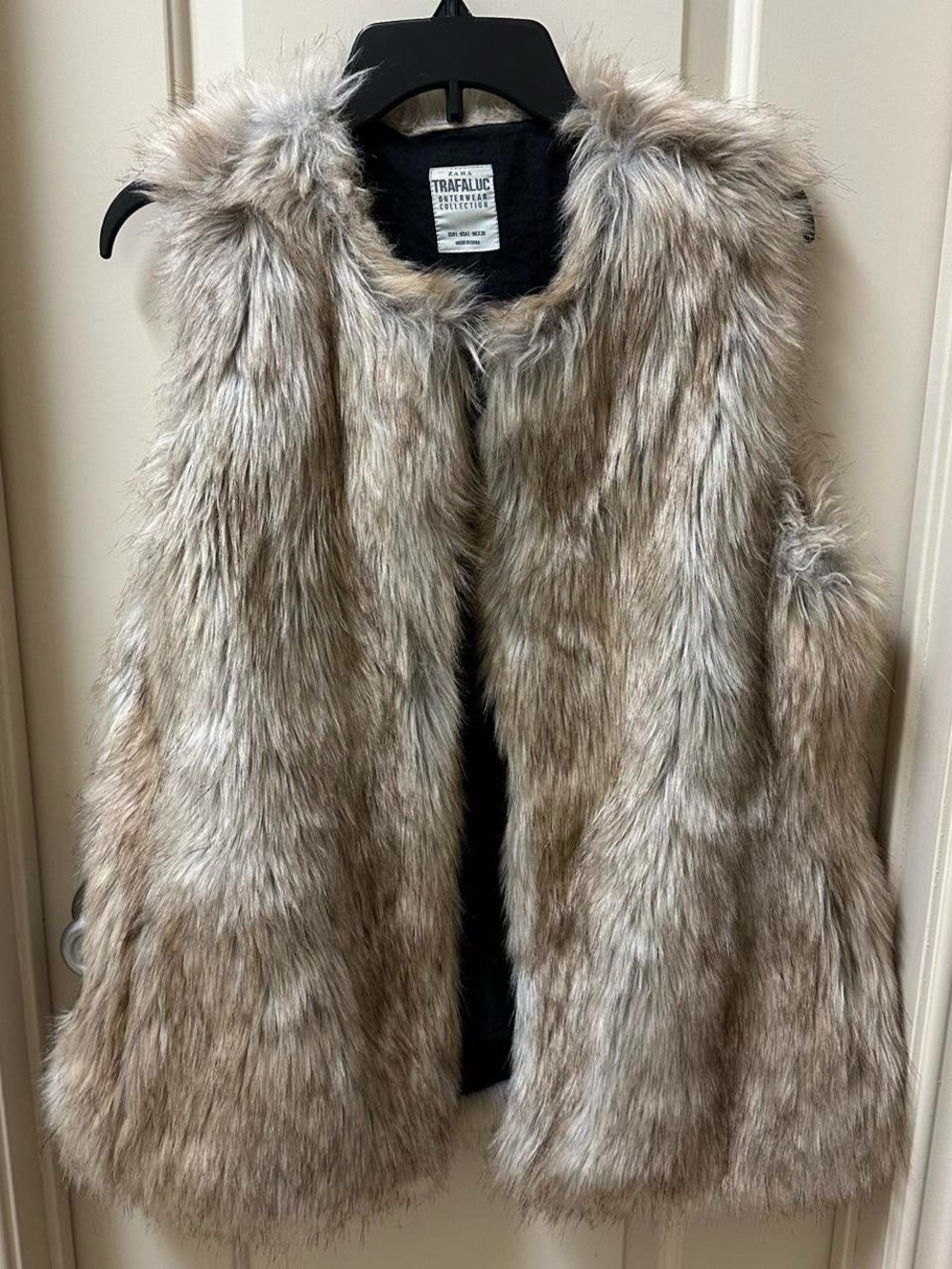 Long stylish faux fur vest. Adult Size Large.